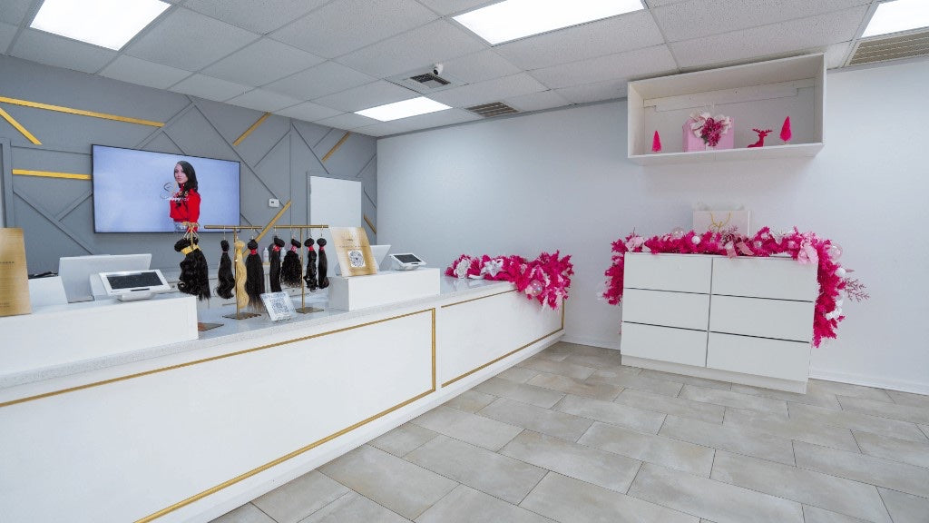Houston North reception desk with POS and hair samples